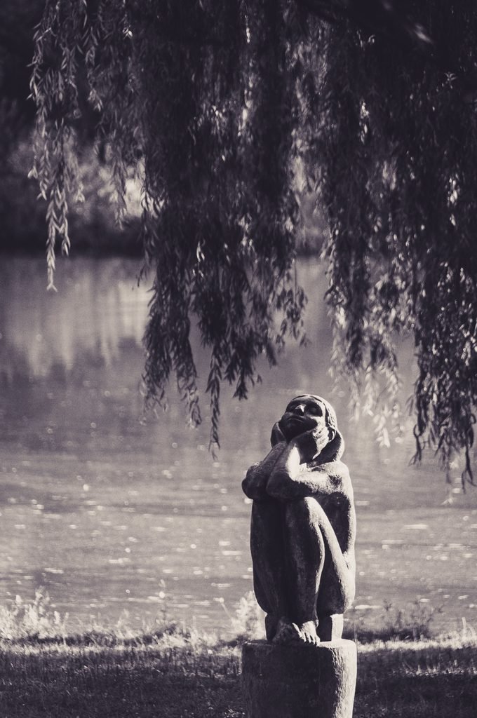 Artistic statue of a woman thinking - set in the natural background.
Pic credit - Pexel -  wal_ 172619